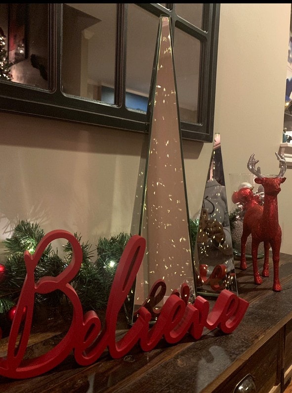 Believe sign with glass tree and reindeer vignette