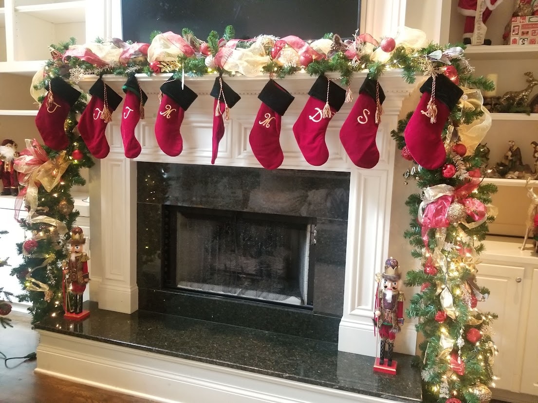 Fireplace with monogram stockings and garland